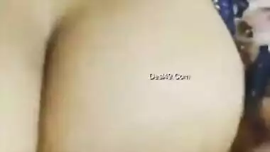 Desi woman in floral robe teases lover demonstrating big breasts