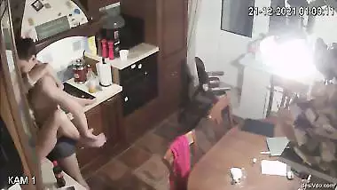 Couple fucks in the kitchen room
