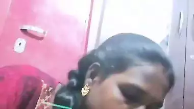 Mature tattooed Tamil wife giving handjob to husband