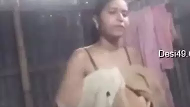 Lover watches and XXX records his village Desi GF taking a shower