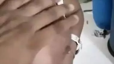 XXX-shaped boobs of slutty Indian are taken out and touched by man