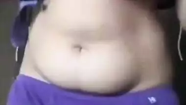 Indian girl takes colorful clothes off to bare hairy pussy for some porn