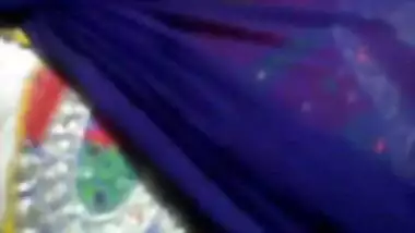 Teenage desi girl fondling her boobs through kameez