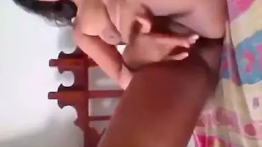 Indian girl playing guitar on pussy